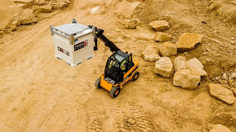 Operator using fuel dispensing equipment with safety gear, highlighting safe on-site refuelling practices and compliance.